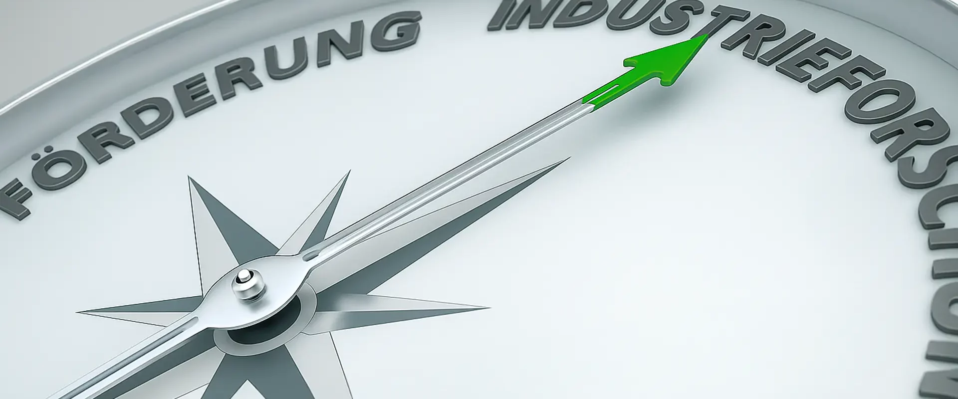 Nahaufnahme eines Kompasses mit grünem Pfeil – symbolisch für Forschungskoordination und strategische Ausrichtung.