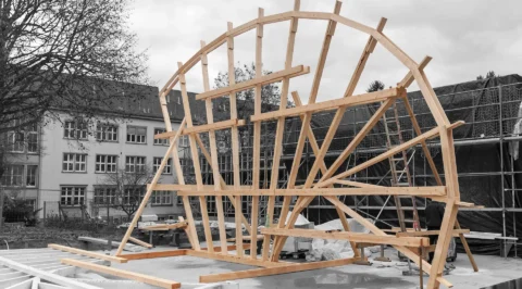 Construction of a large-scale timber structure on a building site
